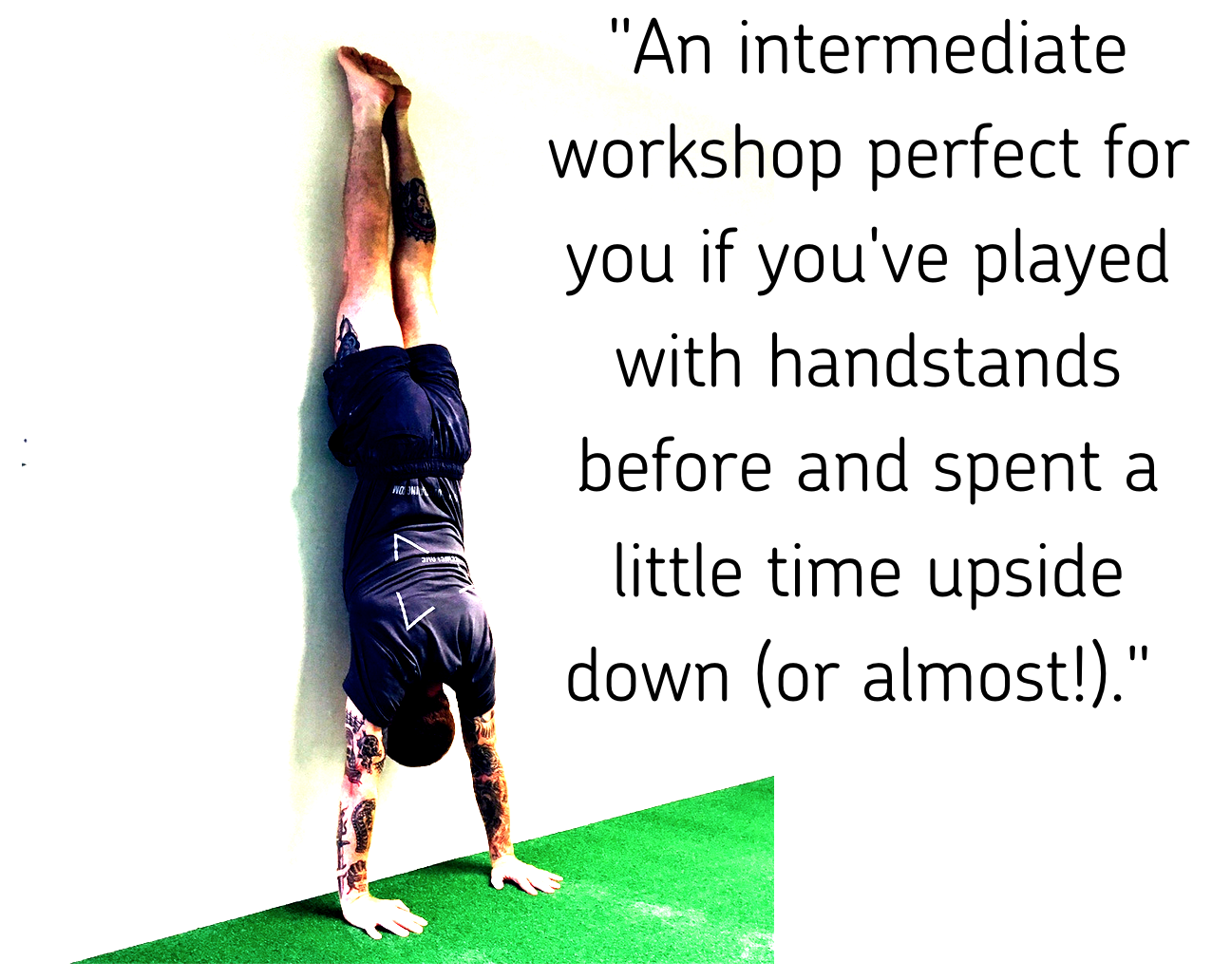 Man doing handstand against wall